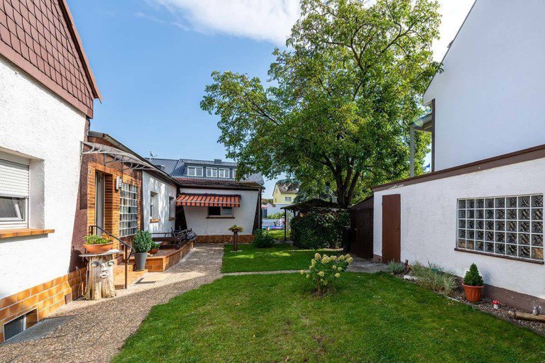 Ansicht Darmstadt Einfamilienhaus Heimstttensiedlung: gepflegtes Haus mit grossem Garten